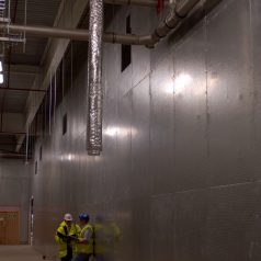 Promat walkaround - showing Durasteel walls in the baggage area *** Local Caption *** H&S - OK
QA - Foot on wall